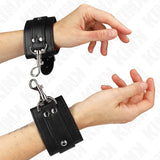 KINK - ABSCHLIEßBARE DUNGEON HANDGELENKSFESSELN SCHWARZ VERSTELLBAR 21-28 CM X 5,5 CM - Vanelion Paradise
