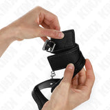 KINK - HANDGELENKFESSELN MIT SCHLANGENMUSTER, SCHWARZ, VERSTELLBAR 20-28 CM X 5,4 CM - Vanelion Paradise