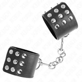 KINK - HANDGELENKFESSELN MIT DRUCKVERSCHLUSS SCHWARZ VERSTELLBAR 19-24 CM X 5,5 CM - Vanelion Paradise