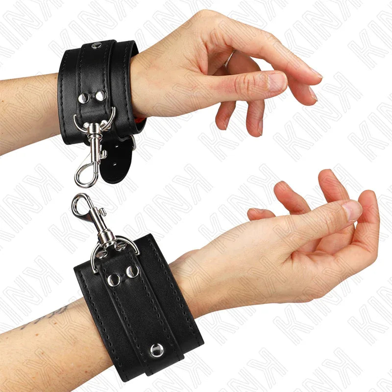 KINK - ABSCHLIEßBARE DUNGEON HANDGELENKSFESSELN SCHWARZ VERSTELLBAR 21-28 CM X 5,5 CM - Vanelion Paradise