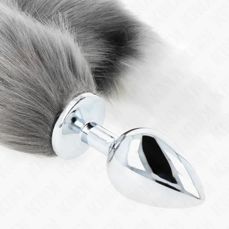 KINK - ANAL PLUG GRÖSSE L 10 X 4 CM MIT KUNSTSTOFFSCHWANZ 40 CM GRAU UND WEISS - Vanelion Paradise