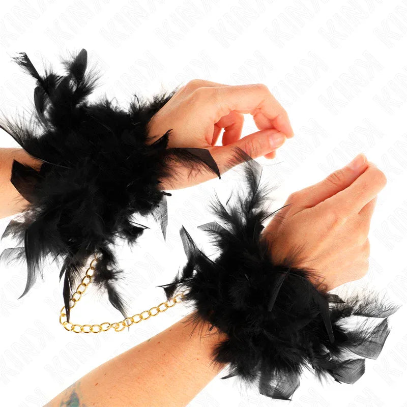 KINK - FEDERHANDMANSCHETTEN MIT GOLDKETTE MODELL 1 - Vanelion Paradise