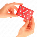 KINK - HANDGELENKFESSELN MIT DRUCKVERSCHLUSS VOLLER NIETEN ROT VERSTELLBAR 19-24 CM X 5,5 CM - Vanelion Paradise