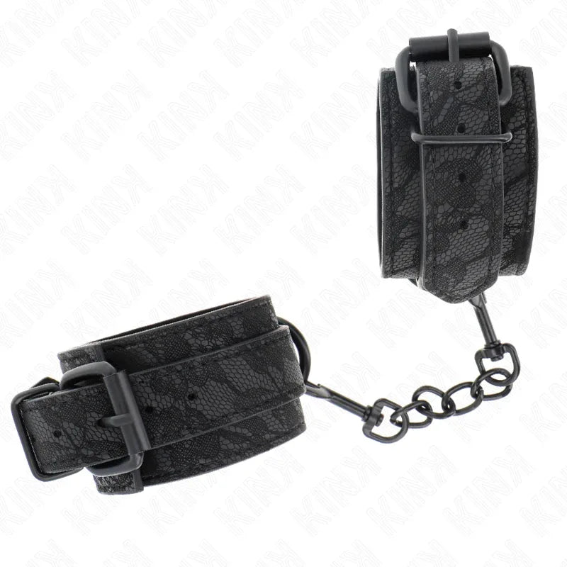 KINK - MIT DUNKLER SPITZE ÜBERZOGENE HANDGELENKMANSCHETTEN VERSTELLBAR SCHWARZ 19-26 CM - Vanelion Paradise