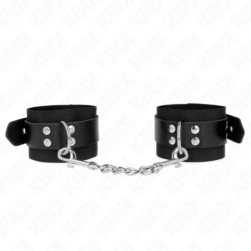KINK - NYLON HANDGELENKFESSELN SCHWARZ MIT LEDERGURTE SCHWARZ VERSTELLBAR 19-29 CM X 5,1 CM - Vanelion Paradise