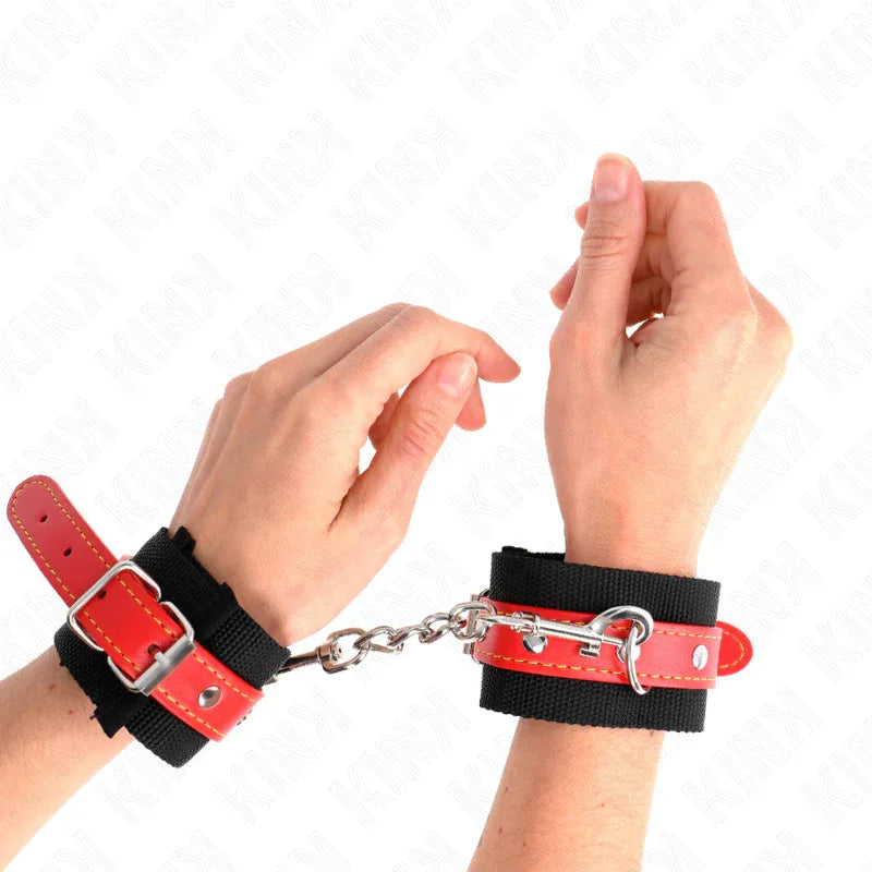 KINK - NYLON HANDGELENKFESSELN SCHWARZ MIT KUNSTLEDER ROT VERSTELLBAR 19-24 CM X 5,5 CM - Vanelion Paradise