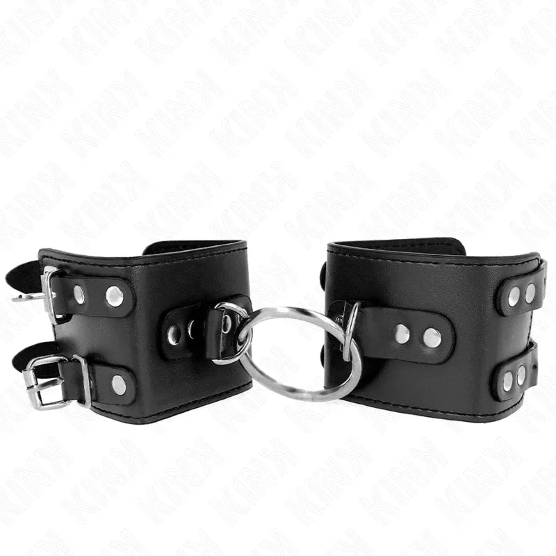 KINK - FESTE HANDGELENKFESSELN MIT RING UND NIETEN VERSTELLBAR SCHWARZ 17-22 CM X 6,5 CM - Vanelion Paradise