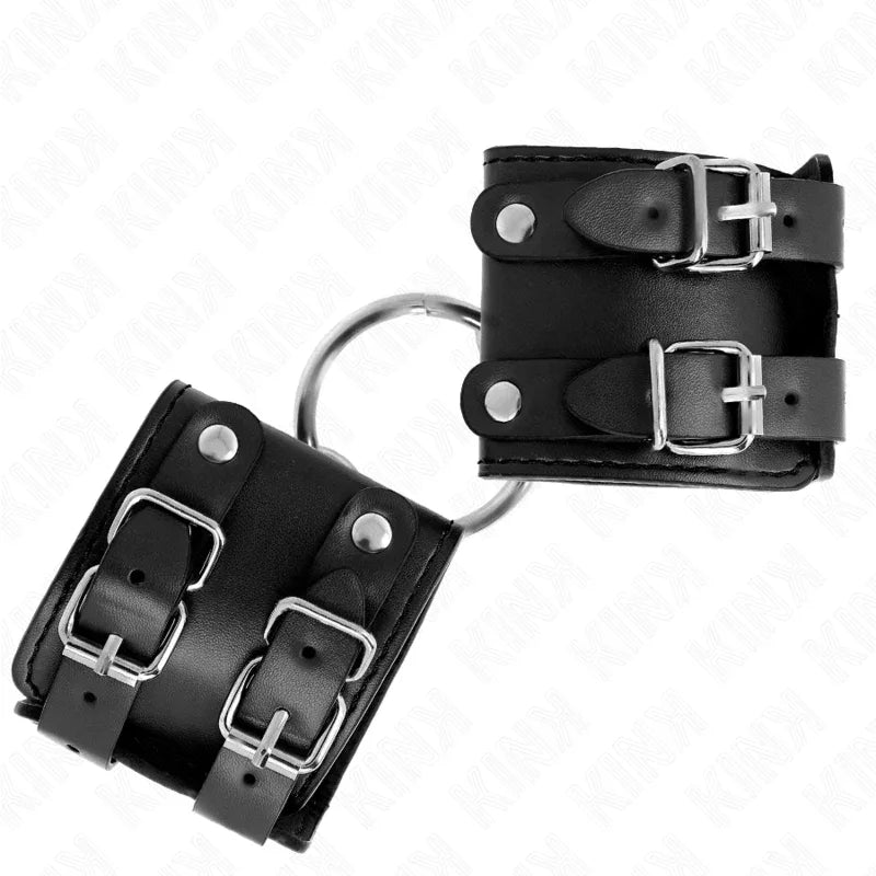 KINK - FESTE HANDGELENKFESSELN MIT RING UND NIETEN VERSTELLBAR SCHWARZ 17-22 CM X 6,5 CM - Vanelion Paradise