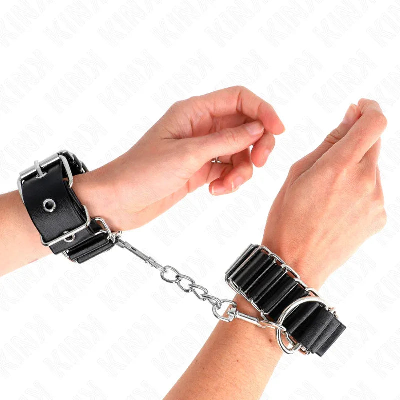KINK - SCHARNIERÄHNLICHE DÜNNE HANDGELENKFESSELN SCHWARZ VERSTELLBAR 16-22 CM X 3,5 CM - Vanelion Paradise