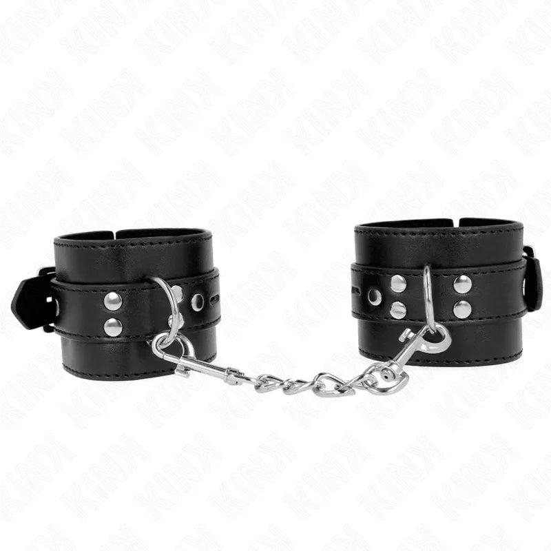 KINK - HANDGELENKFESSELN SCHWARZ MIT SCHWARZEM GÜRTEL VERSTELLBAR 17-28 CM X 6 CM - Vanelion Paradise