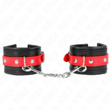 KINK - HANDGELENKFESSELN SCHWARZ MIT ROTEM GÜRTEL VERSTELLBAR 17-28 CM X 6 CM - Vanelion Paradise