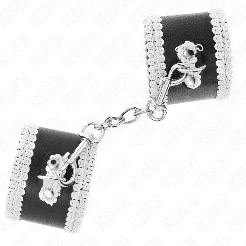 KINK - SCHWARZE HANDGELENKFESSELN MIT WEISSER DEKORIERTER SPITZE, VERSTELLBAR 20-23 CM X 5,5 CM - Vanelion Paradise