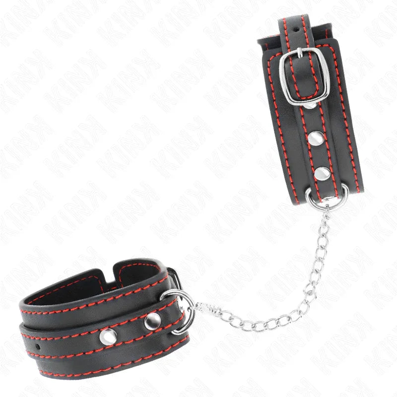 KINK - KLEINE HANDGELENKSFESSELN SCHWARZ MIT ROTEM FUTTER VERSTELLBAR 14-24 CM X 3,5 CM - Vanelion Paradise