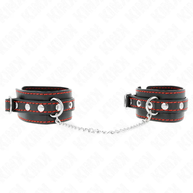 KINK - KLEINE HANDGELENKSFESSELN SCHWARZ MIT ROTEM FUTTER VERSTELLBAR 14-24 CM X 3,5 CM - Vanelion Paradise