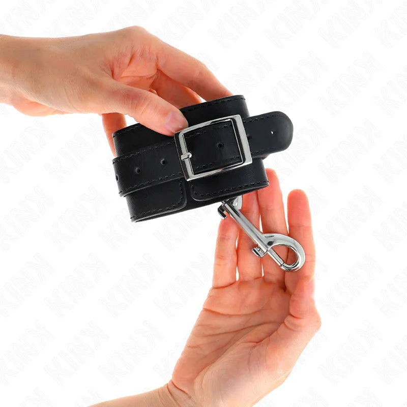 KINK - HANDGELENKFESSELN - EINZELNE NIETENREIHE SCHWARZ VERSTELLBAR 17-28 CM X 5 CM - Vanelion Paradise