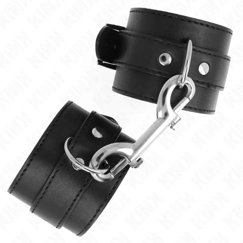 KINK - HANDGELENKFESSELN - EINZELNE NIETENREIHE UND GROSSE SCHNALLE SCHWARZ VERSTELLBAR 17-28 CM X 5 CM - Vanelion Paradise