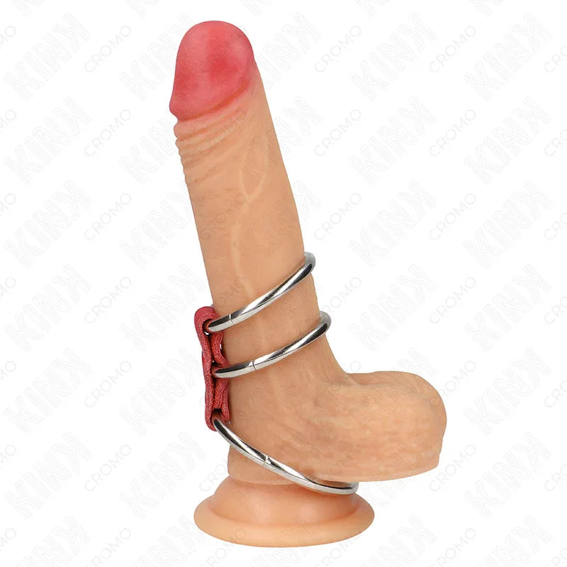 KINK - DREIFACH METALL PENISRING 3,7 CM BIS 5 CM VERBUNDEN MIT ROTEM LEDER - Vanelion Paradise