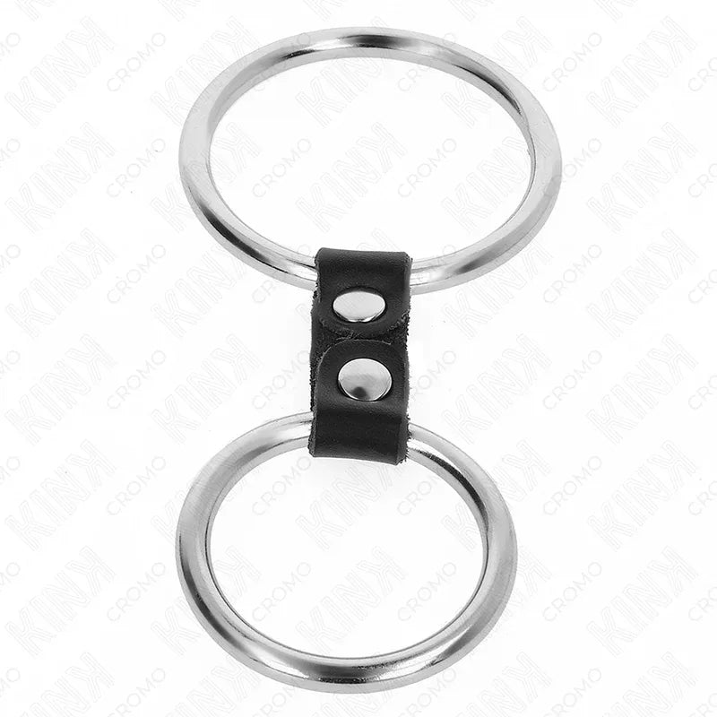 KINK - DOPPELTER PENISRING AUS METALL 3,7 CM BIS 5 CM VERBUNDEN DURCH LEDERBAND MODELL 2 - Vanelion Paradise